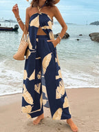Fashionable Resort-Style Printed Halterneck Slit Jumpsuit With Wide-Leg Pants