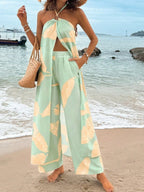 Fashionable Resort-Style Printed Halterneck Slit Jumpsuit With Wide-Leg Pants