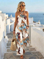 Fashionable Resort-Style Printed Halterneck Slit Jumpsuit With Wide-Leg Pants